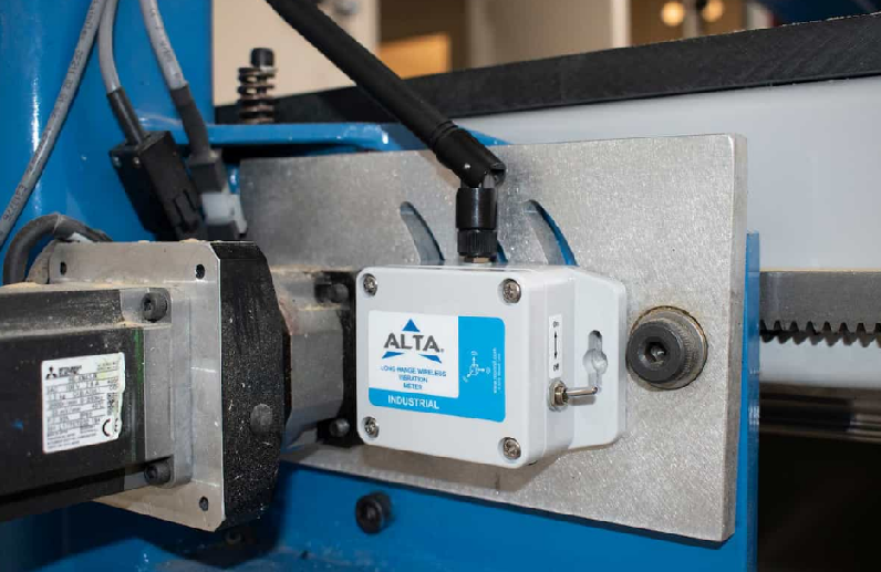 Wireless HVAC vibration sensor installed on a commercial equipment.