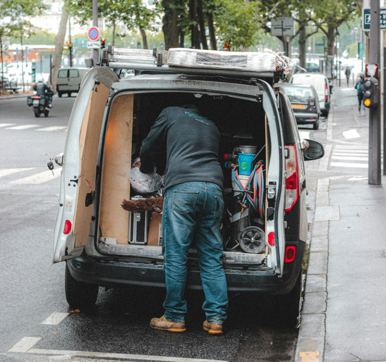 Facility services technician arriving on site for an emergency response call